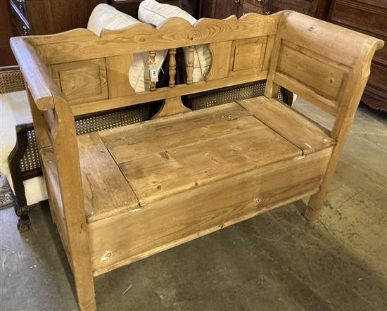 A late 19th century Continental pine box seat settle, width 124cm, depth 48cm, height 91cm